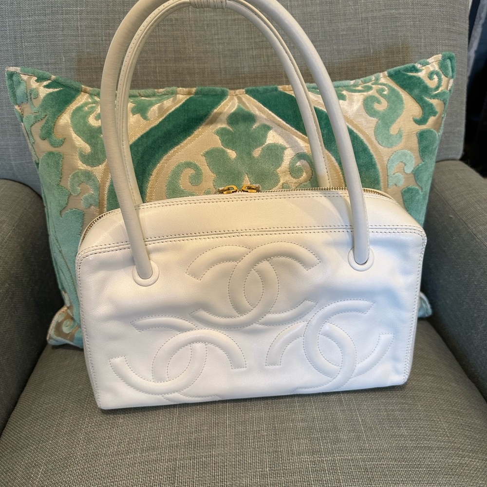 Chanel; 3 CC logo pattern embedded at the front and back. Excellent condition.